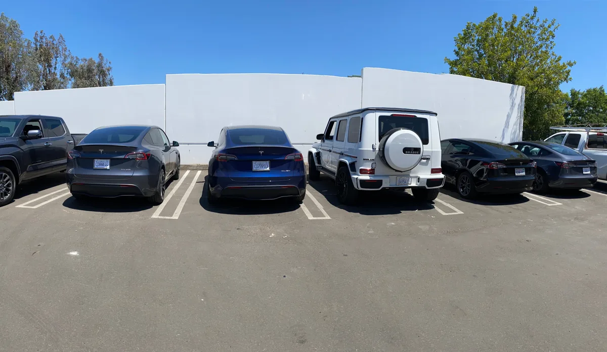 Vehicles parked outside the Superior shop